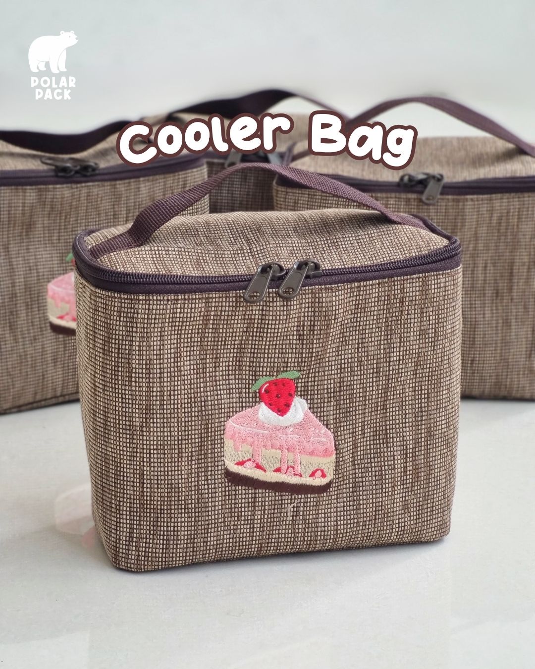 Cooler bag coklat motif kue strawberry lucu dari Polar Pack.